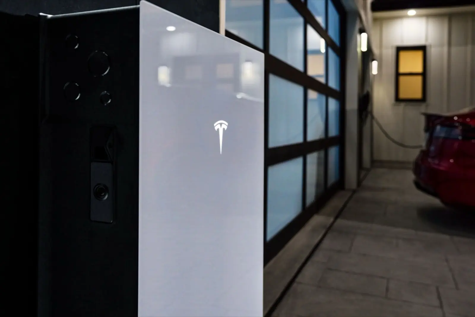 Home battery installed in a garage, providing backup power during an outage