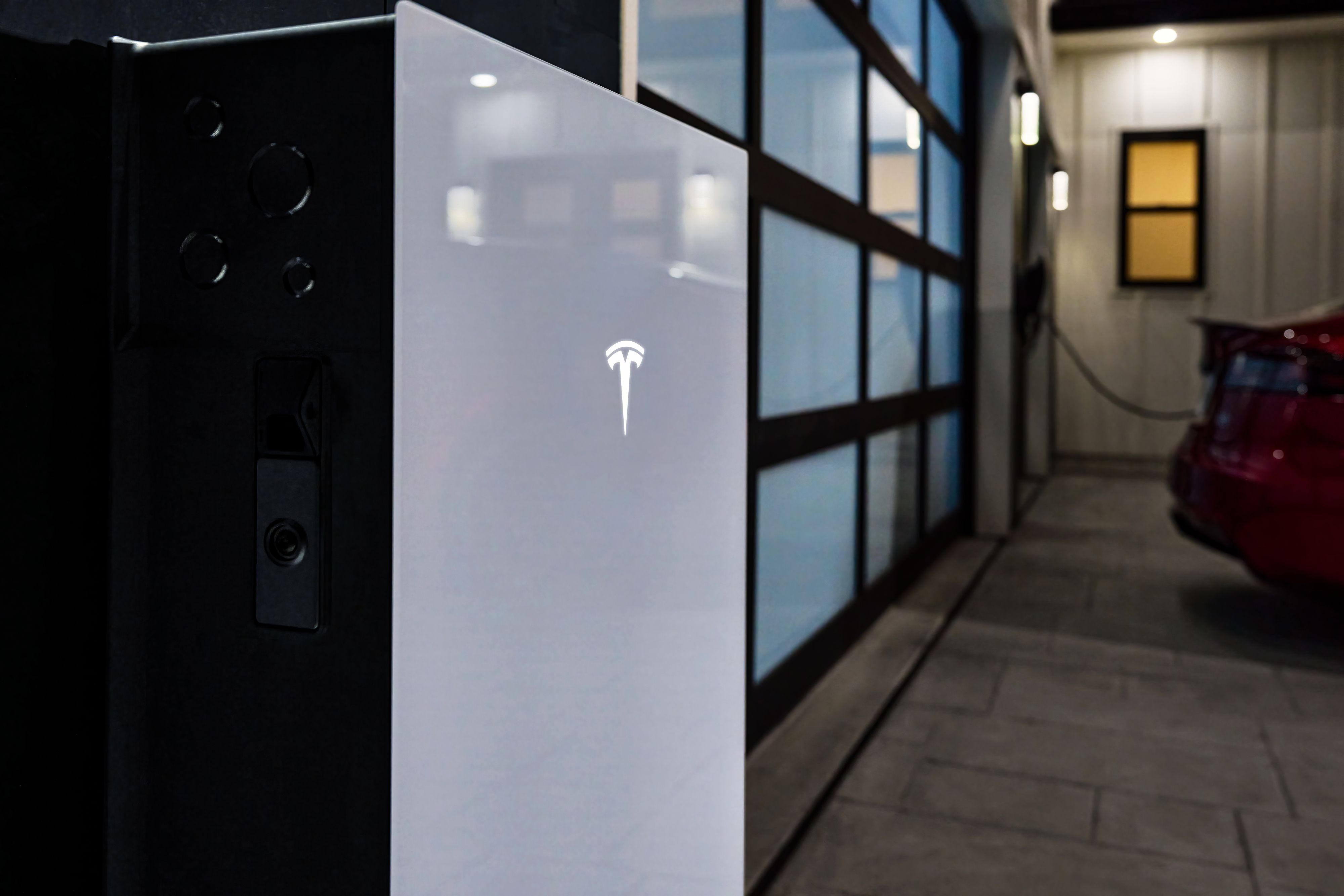 Tesla Powerwall 3 mounted on exterior of home